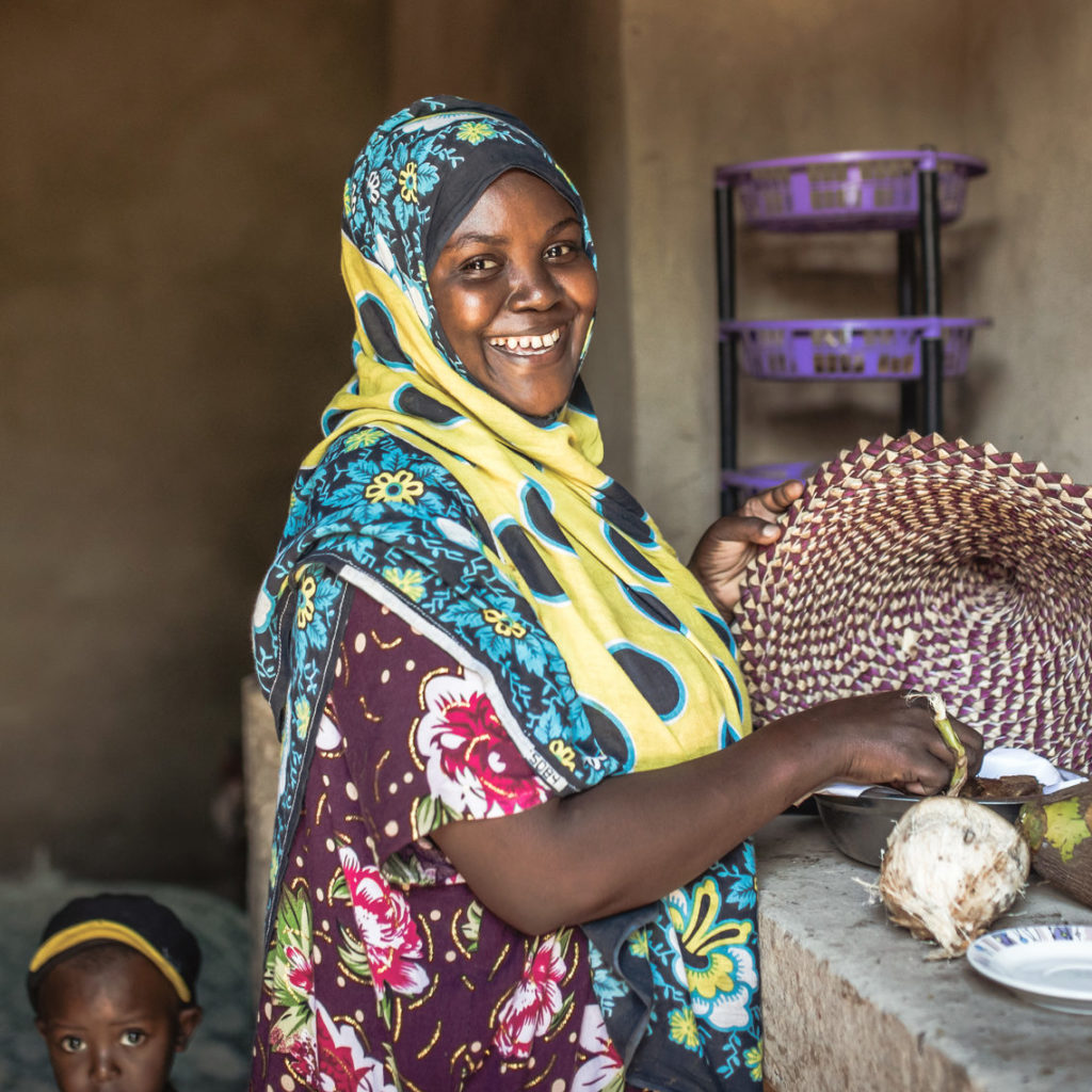 Meet friendly Tanzania locals like this lady when you take a tailor-made trip with Alfred&.